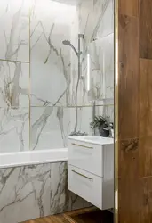 Bathroom design marble and wood tiles