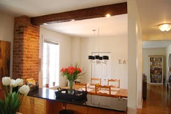 Kitchen with beam on the wall photo