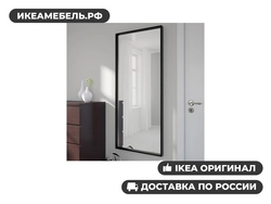 Дәліздегі қабырғаға орнатылған толық айна фотосуреті