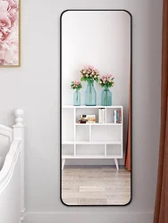 Wall-mounted full-length mirror in the hallway photo