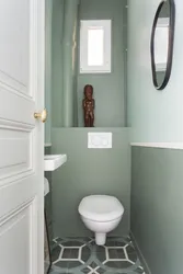 Painting a toilet in an apartment photo