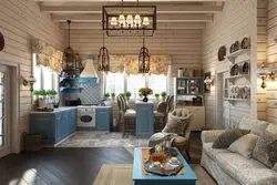 Kitchen and living room at the dacha in a wooden house photo