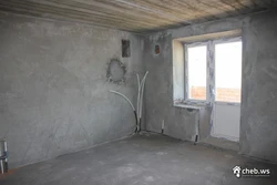 Пәтерді жөндеу жаңа ғимарат фотосында өрескел әрлеу
