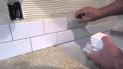 How to lay tiles in the kitchen photo