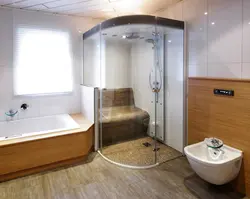 Shower and bathtub in the bathroom photo