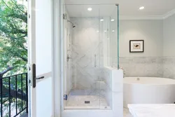 Shower and bathtub in the bathroom photo