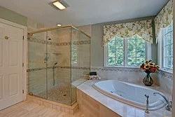 Shower and bathtub in the bathroom photo