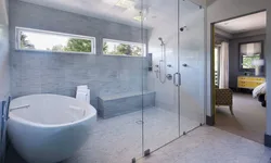Shower and bathtub in the bathroom photo