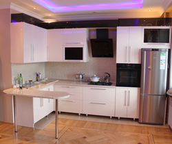 Glossy kitchens with bar counters photo