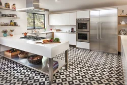 Apron and floor in the kitchen with one tile photo