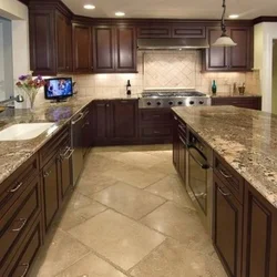 Apron and floor in the kitchen with one tile photo