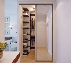 Dressing room with compartment door to the hallway photo