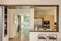 Opening between kitchen and living room photo