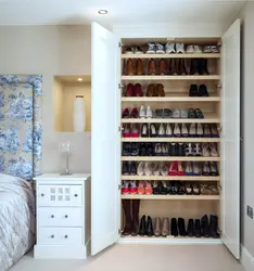 Hallway design with shoe rack in apartment