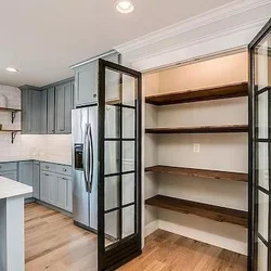 Photo of kitchen in apartment cabinets