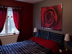 Curtains with roses in the bedroom interior