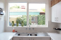 Bath in Khrushchev with a window to the kitchen design