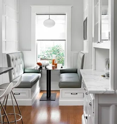 Small kitchen design with sofa and table