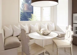 Small kitchen design with sofa and table