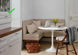 Small kitchen design with sofa and table