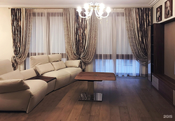 Design of curtains in the living room with two windows in a modern style photo