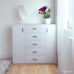 Chest of drawers for clothes in the bedroom photo