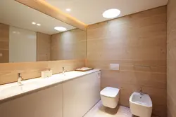 Finishing a bathroom in a wooden house with plastic panels photo
