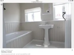 Finishing a bathroom in a wooden house with plastic panels photo