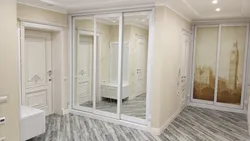 Wardrobe with mirror in the hallway photo