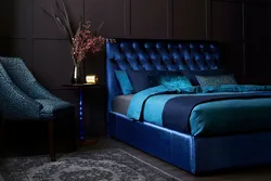 Soft blue bed in the bedroom interior