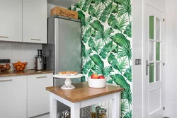 Photo wallpaper leaves in the kitchen interior