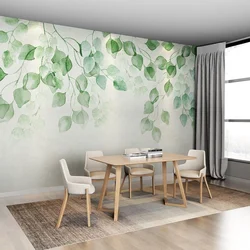 Photo wallpaper leaves in the kitchen interior