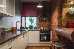 Photo Of Kitchen Interior With Red Brick