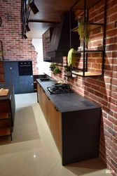 Photo of kitchen interior with red brick