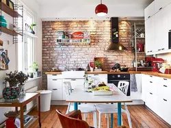 Photo of kitchen interior with red brick