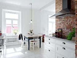 Photo Of Kitchen Interior With Red Brick