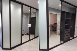 Photo of sliding wardrobes in the hallway with a mirror on one door