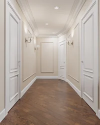 Hallway design in an apartment with white doors photo