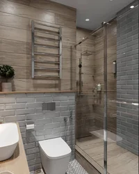 Bathroom design with wood tile shower