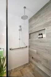 Bathroom design wood and gray tiles