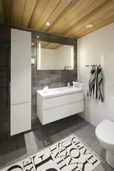 Bathroom design wood and gray tiles