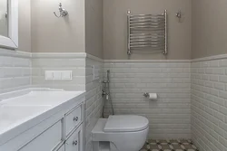 Bathroom design with half tiles