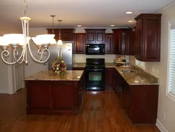 Kitchen Interior In Mahogany Color