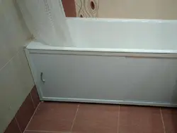 Bath screen made of plastic panels photo