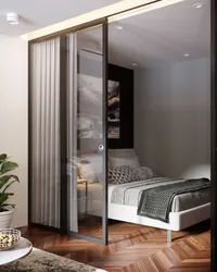 Bedroom partition in a one-room apartment photo