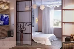 Bedroom partition in a one-room apartment photo