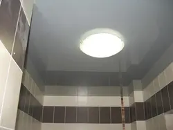 Lighting in the bathroom with suspended ceiling photo in the interior