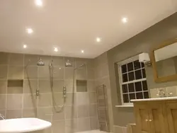 Lighting in the bathroom with suspended ceiling photo in the interior