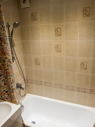 Photo Of A Regular Bathroom With Tiles