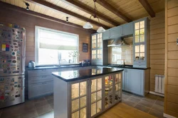 Kitchen in your wooden house with a window photo